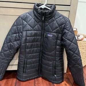 Patagonia women’s black puffer jacket size medium.